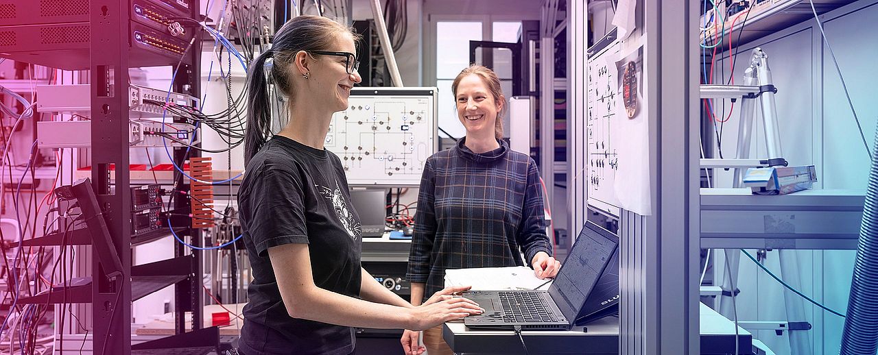 Researchers working on an experimental setup