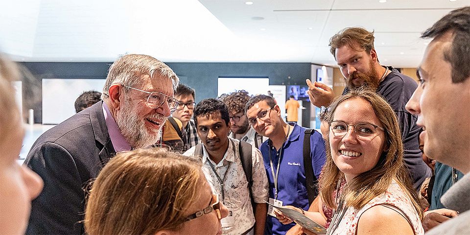 Bill Philillips with young scientists