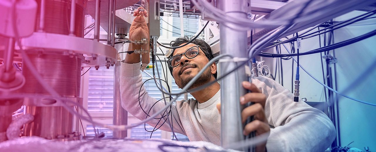 Researcher working on an experimental setup