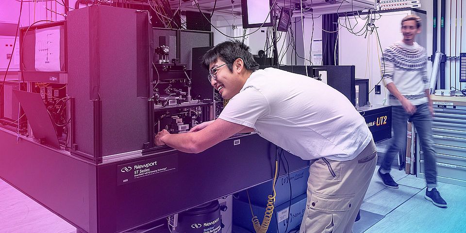 Researchers working on an experimental setup